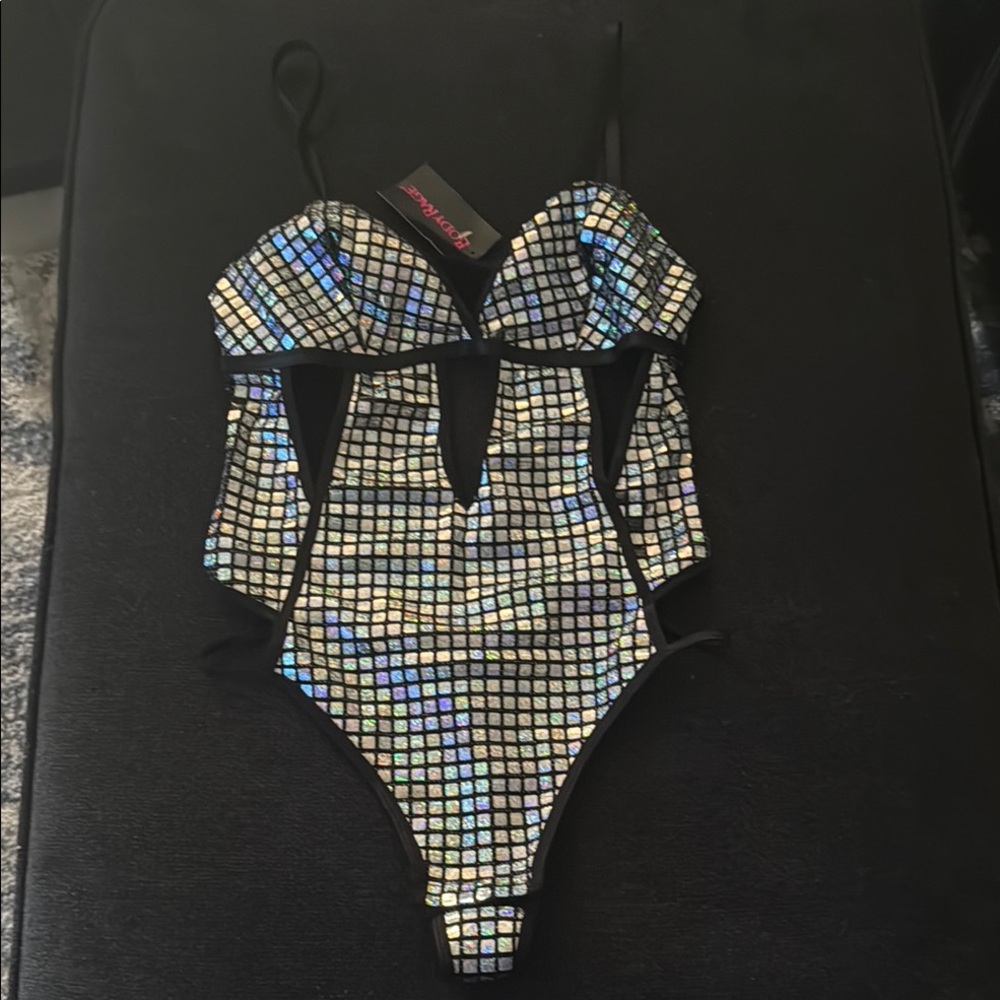 Silver and black Holographic Cutout One-Piece bodysuit with snap closure
